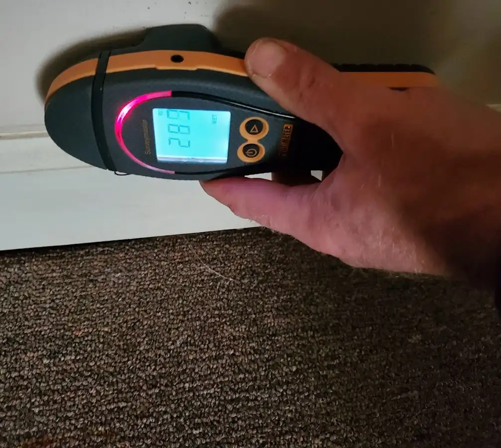 Moisture detection at baseboard during Storm Damage Restoration in Oak Bluffs
